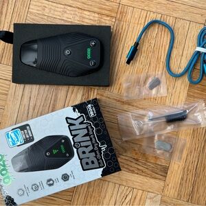 Brink Black Device with Green and Blue Accessories